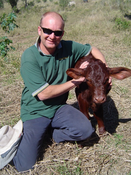 James & newborn bull calf in 2010.
